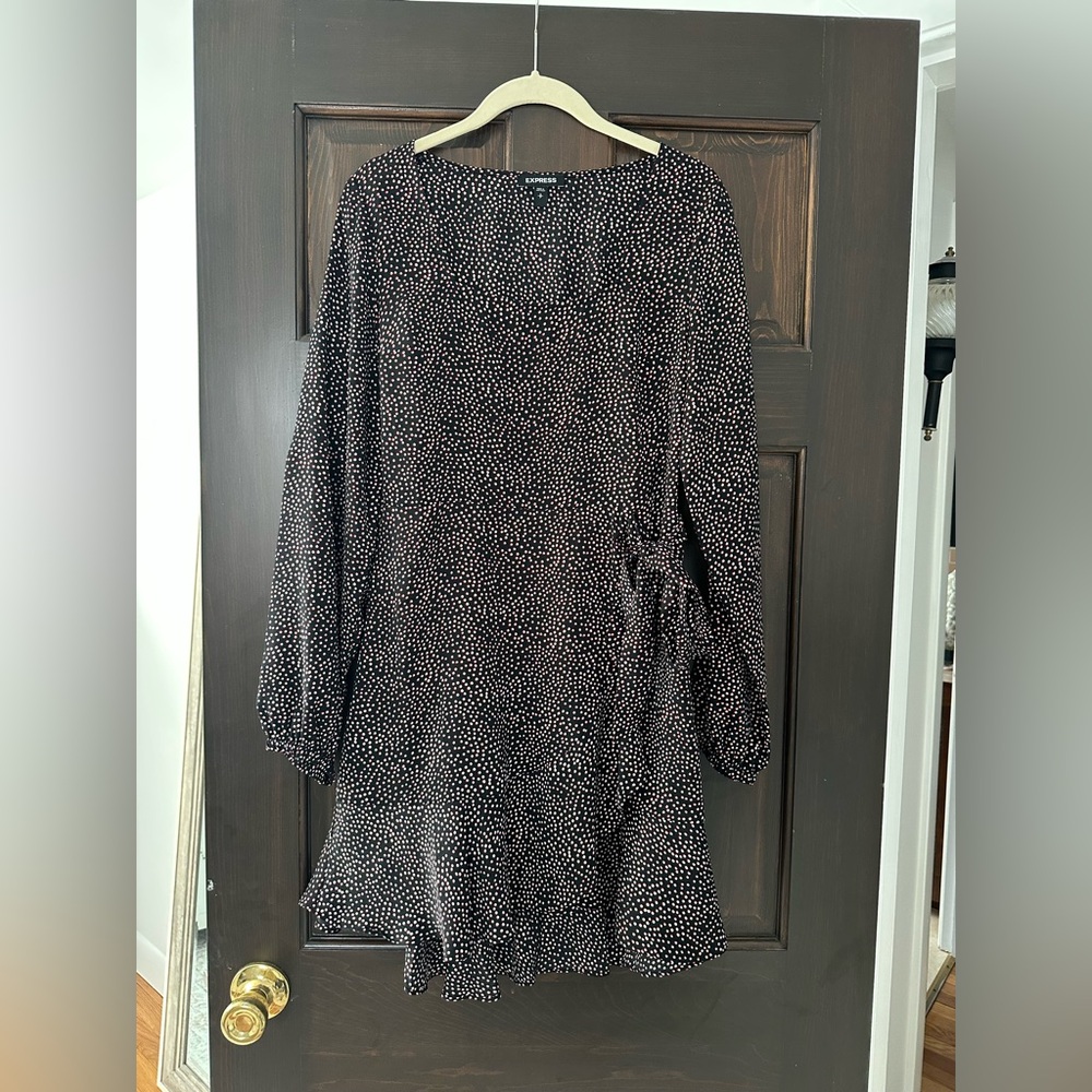 Mini black dress with red and white dots. Great for a holiday party
